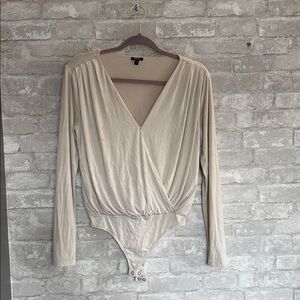 Express Cream Surplice Long-Sleeve Bodysuit